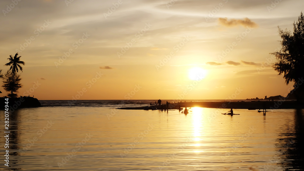 Paddle, watch the sunset on a relaxing day on one of the island's beaches.