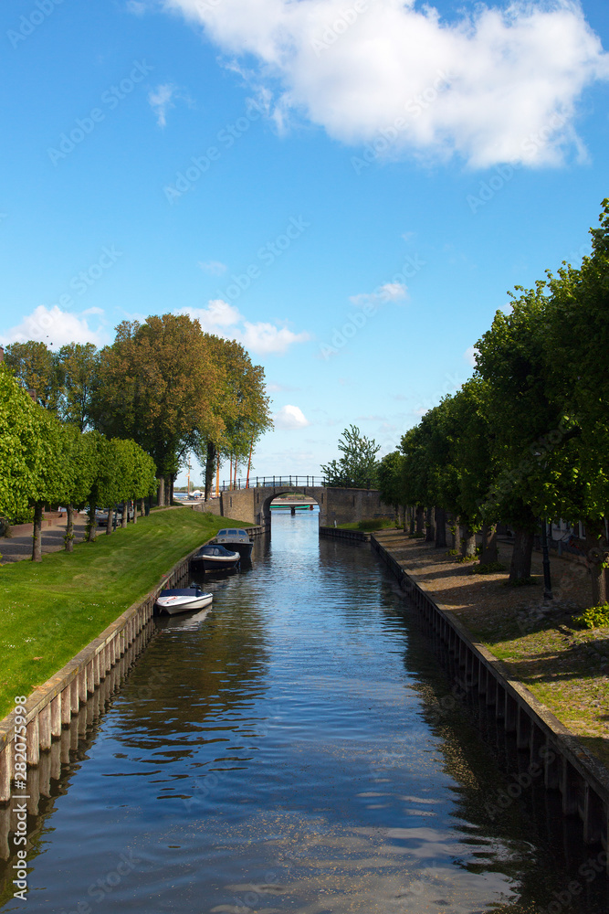 Canal in historic Dutch  town Sloten, Friesland