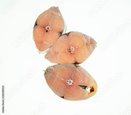 Fish Scomberomorus pieces isolated on white background