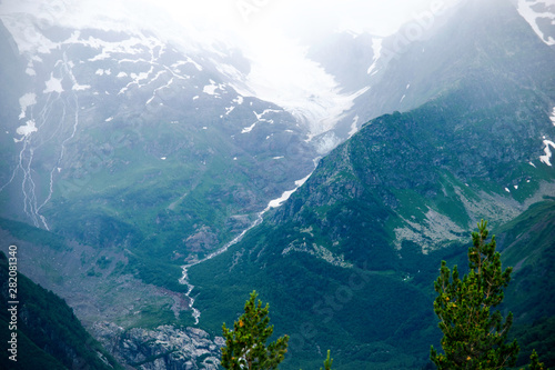 mountain landscape - mountains forest  rocks glaciers snow clouds  Dombay  Karachay-Cherkessia  Russia