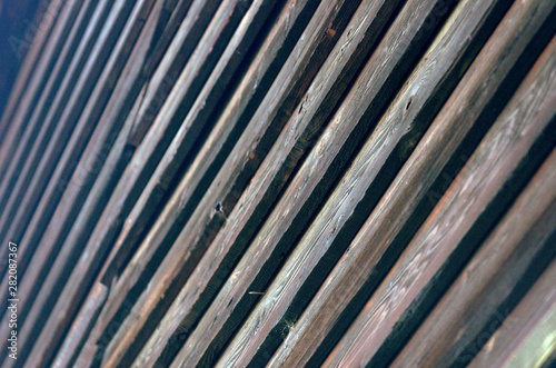 Diagonal View of Weathered Timber Planks Background.