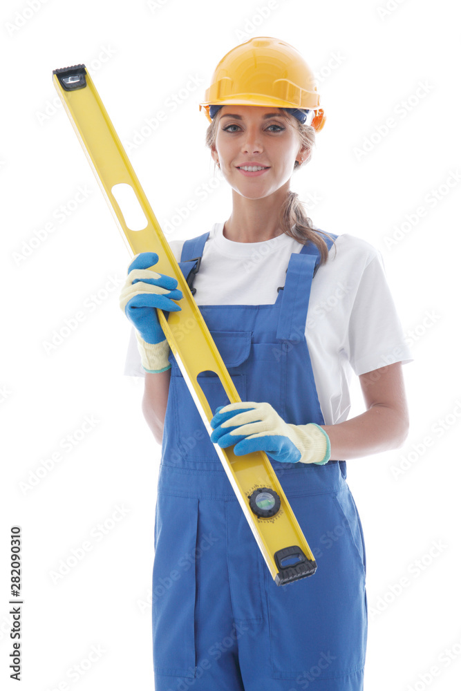 Handywoman with building level Handywoman with building level