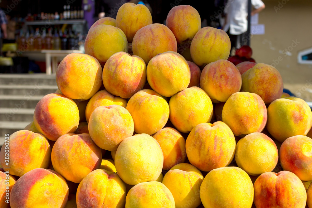 Peach fruit close-up. Texture background of sweet yellow ripe peaches. Fruit Peaches Food Image Peach fruit close-up. Texture background of sweet yellow ripe peaches. Fruit Peaches Food Image