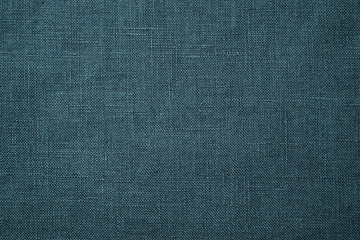 Fabric closeup. Dark green linen texture