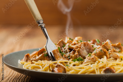 Spaghetti with mushroom chanterelles photo