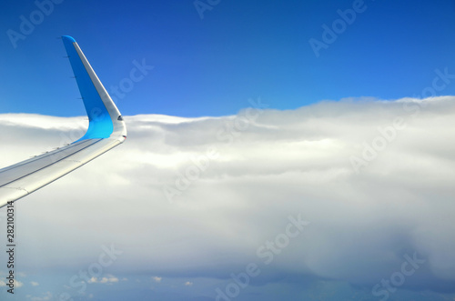 Blue sky and silky white clouds with impressive shapes, views over the heights