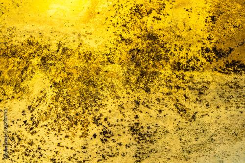 aged and grunge metalic gold texture for vintage gold background 