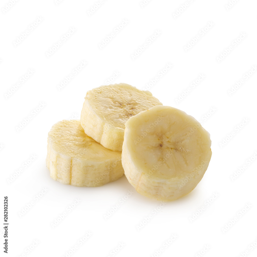 Peeled banana slices isolated over a white background.