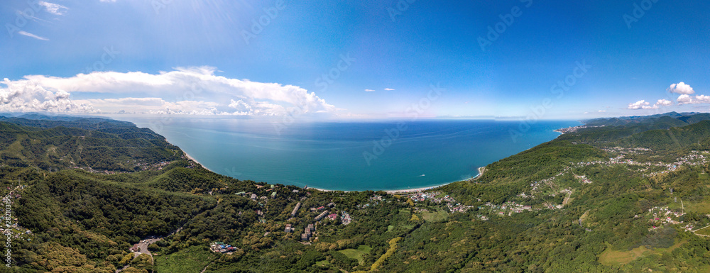 Air drone 360 view - on a mountain road near the village of Volkonka (South of Russia, the Caucasus) on a summer day. Not far away - the Black Sea