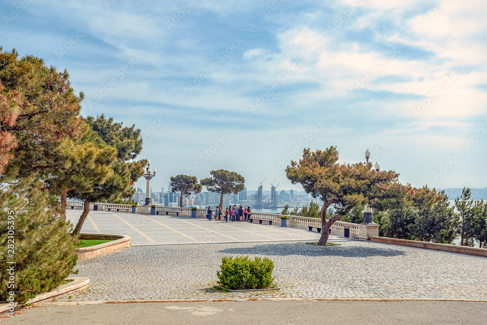05/05/2019 Baku, Azerbaijan, observation deck Highland Park with panoramic view of Baku and a group of Chinese tourists on it 05/05/2019 Baku, Azerbaijan, observation deck Highland Park with panoramic view of Baku and a group of Chinese tourists on it