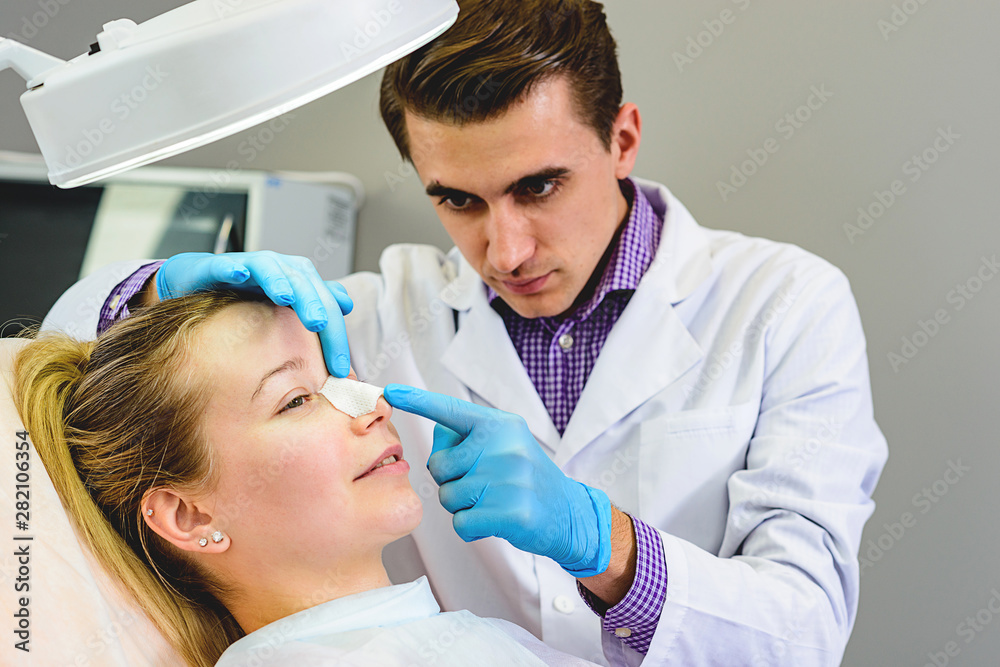 Fototapeta premium The doctor prepares the patient for surgery.