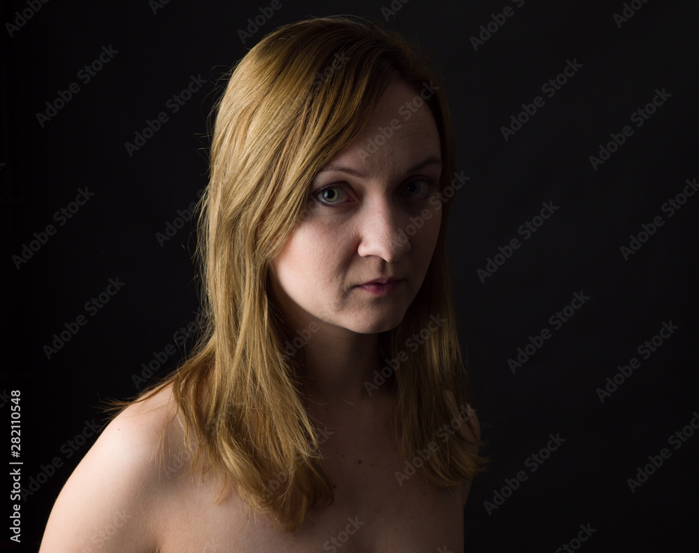 portrait of young woman, no make up, low key, brown dark hair, natural looking making expressions portrait of young woman, no make up, low key, brown dark hair, natural looking making expressions