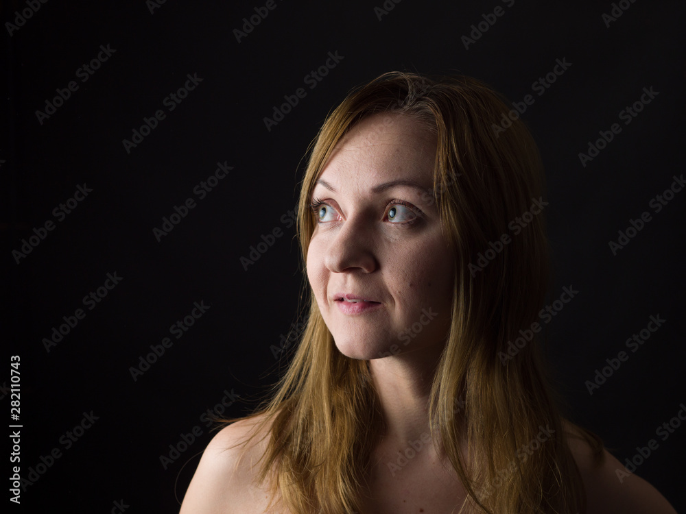 portrait of young woman, no make up, low key, brown dark hair, natural looking making expressions portrait of young woman, no make up, low key, brown dark hair, natural looking making expressions