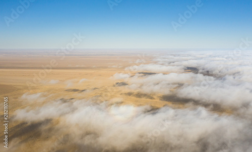 Coastal fog rolling over the desert landscape of Skeleton coast. Skeleton coast  Namibia.