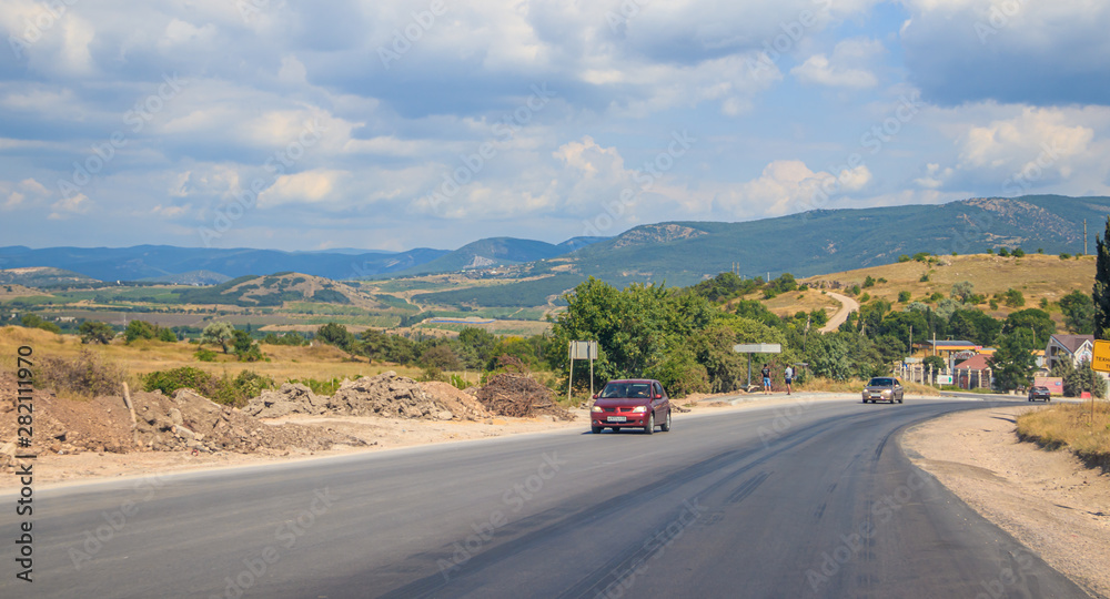 Russian asphalt roads. Background road. Roads in the mountains of Crimea. Travel by car. Road views. Russian asphalt roads. Background road. Roads in the mountains of Crimea. Travel by car. Road views.