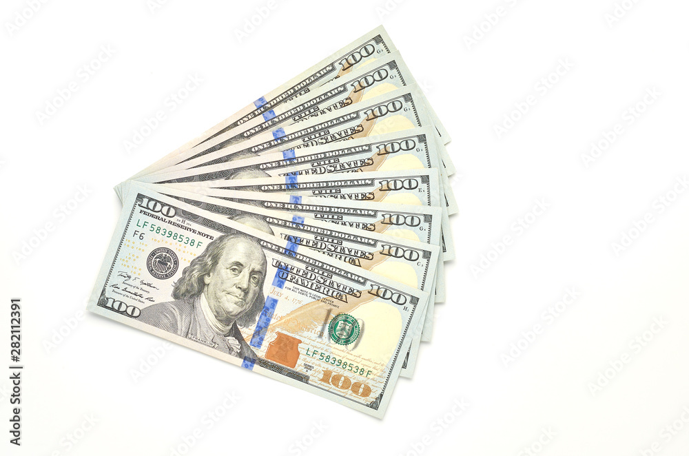 Eight hundred dollars in hundred dollar bills on a white background. The view from the top.