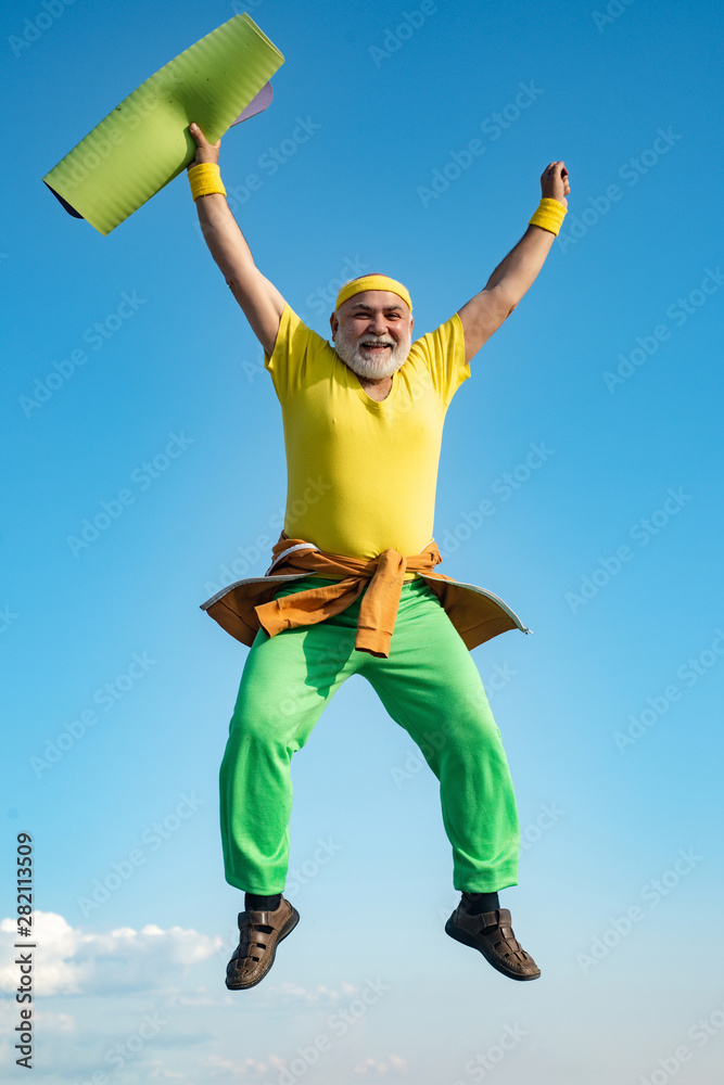 Old man jumping on blue sky background. Freedom retirement concept. Funny  Senior man Jumping. Stock Photo | Adobe Stock