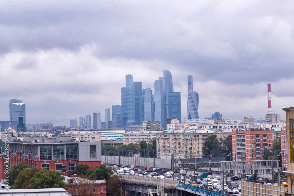 View of Moscow from Sparrow Hills (Vorobyovy Gory) at cloudy day. Translate: 3rd Ring, Kutuzovsky Avenue, Komsomolsky Avenue, Vernadsky Avenue, MKAD