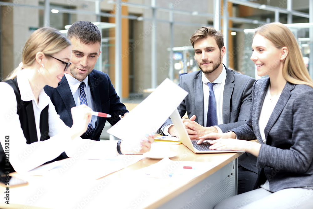Group of business partners discussing ideas and planning work in office. Group of business partners discussing ideas and planning work in office.