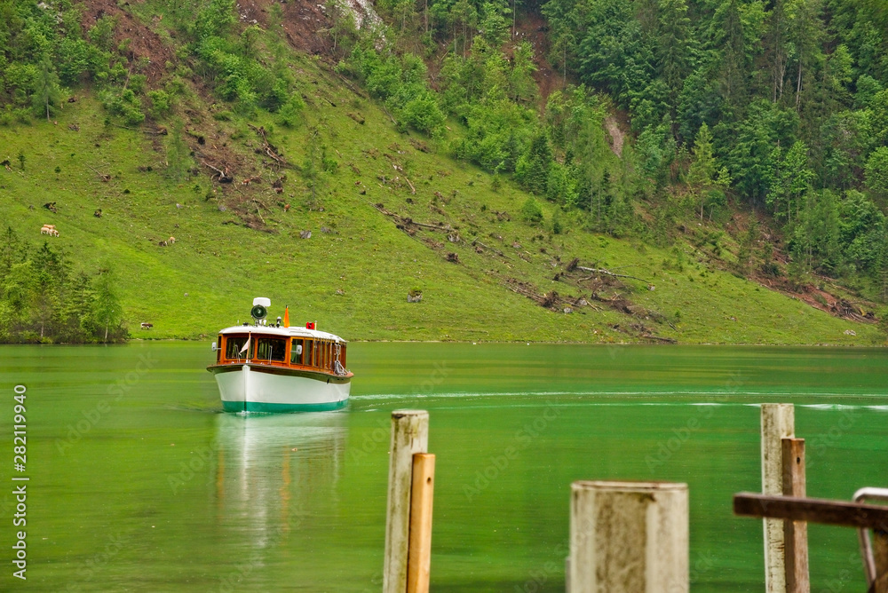 Lake boat approaching dock Lake boat approaching dock