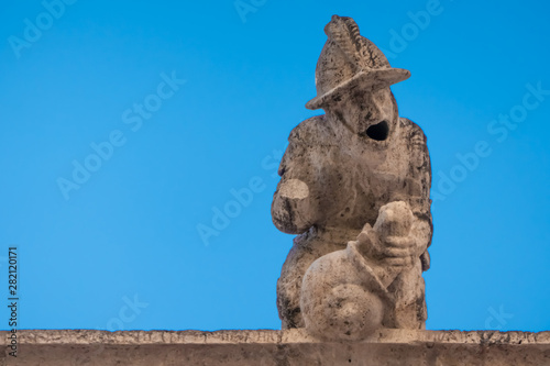 Stunning gargoyle in the Llotja de la Seda (Medieval Silk Exchange), a late Valencian Gothic-style civil building in Valencia, Spain.