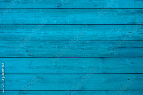 Blue wooden background texture. Horizontal planks, bars