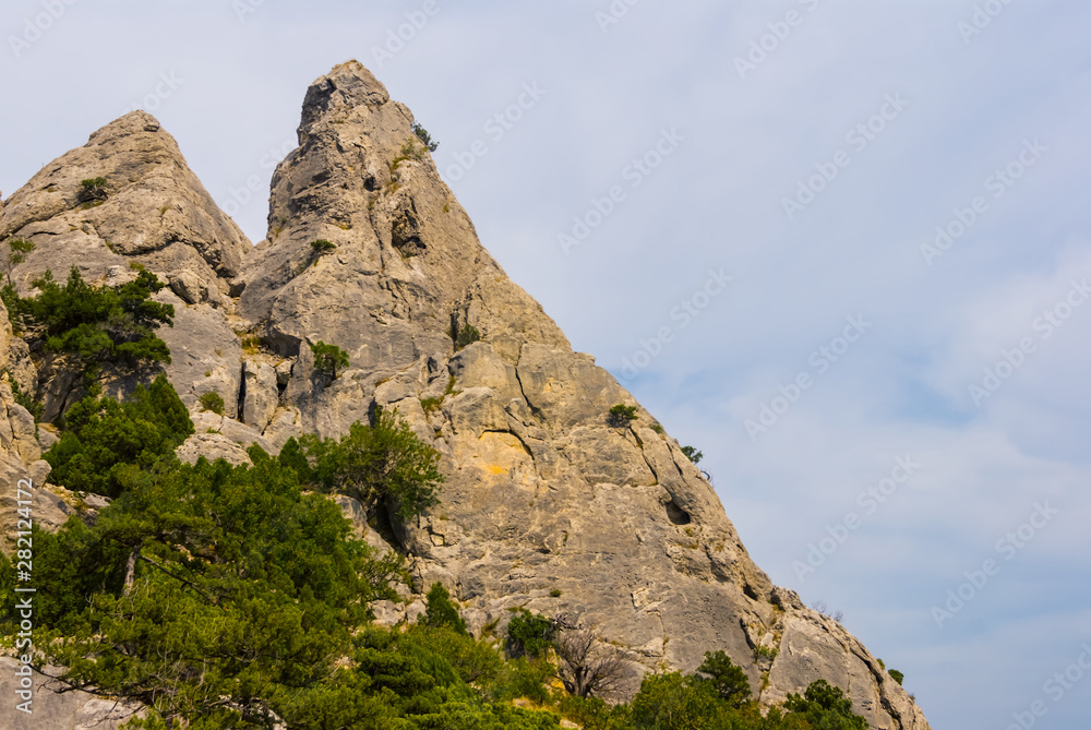 mount peak on a blue cloudy sky backgrouns