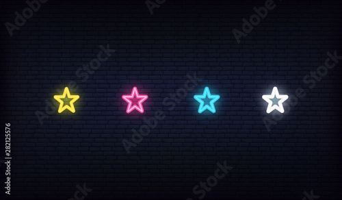 Star neon set. Glowing colorful stars of neon yellow, red, blue, white colors