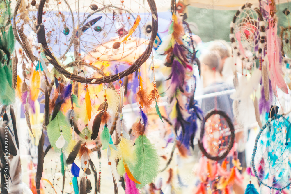 Fototapeta premium Dreamcatchers on a artisan market. Boho style, summer fest