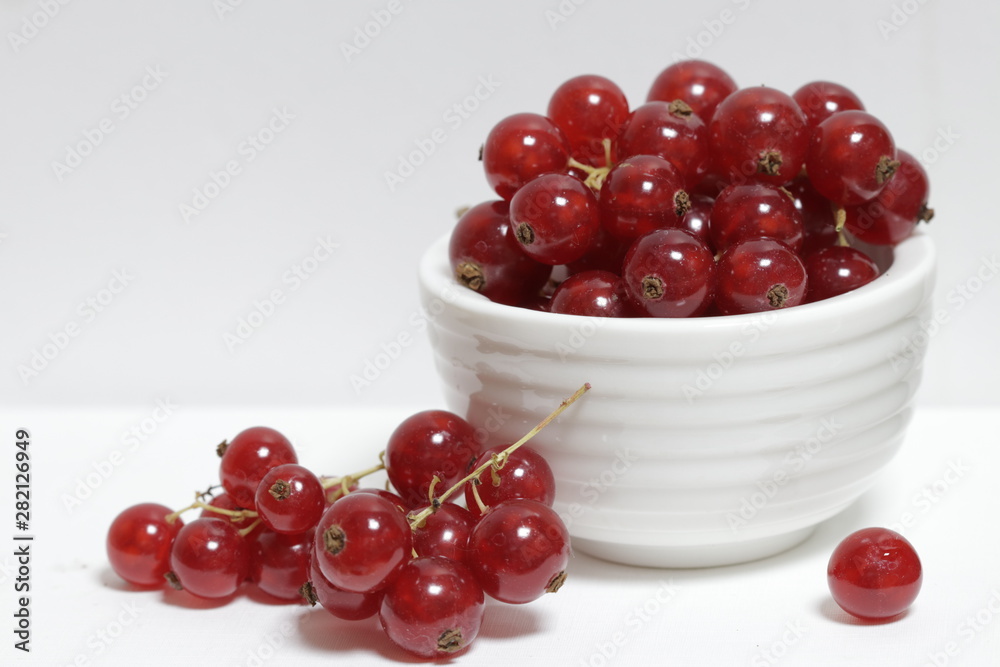 Fresh redcurrants in a bowl Fresh redcurrants in a bowl