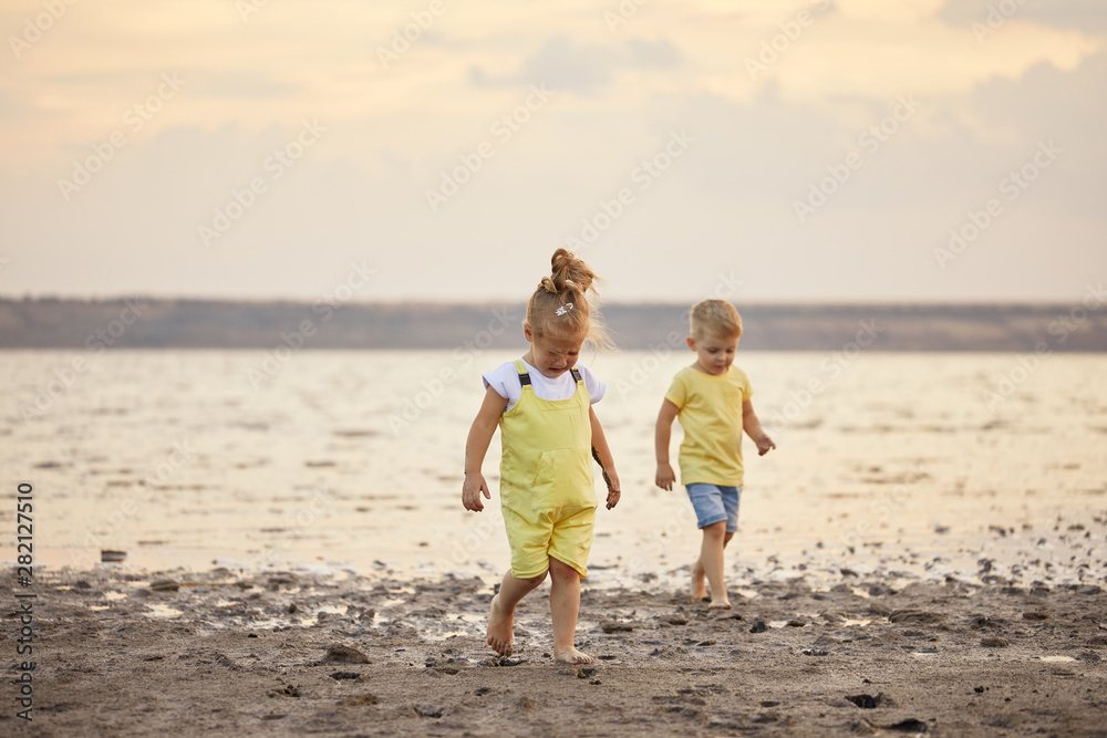 Children quarrel. Sad, Upset and unhappy toddler girl outdoor. problem child. Education for small kids. Children quarrel. Sad, Upset and unhappy toddler girl outdoor. problem child. Education for small kids.