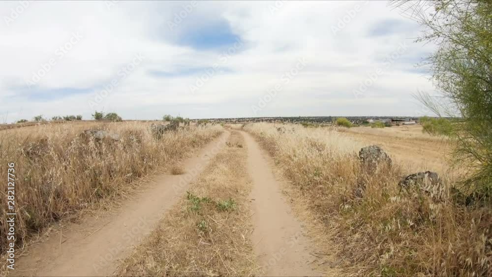 a rural path between Fuente la Lancha and Hinojosa del Duque, province of Cordoba, Andalusia, Spain a rural path between Fuente la Lancha and Hinojosa del Duque, province of Cordoba, Andalusia, Spain