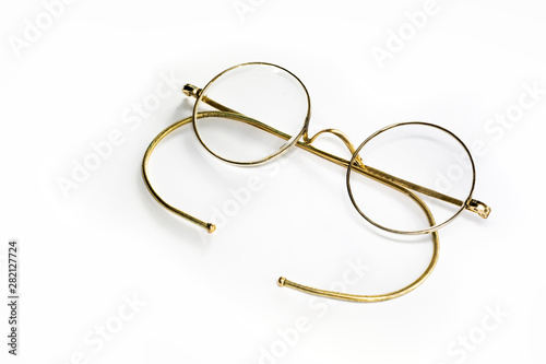 golden glasses isolated on white background