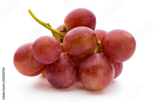 Ripe red grape isolated on white.