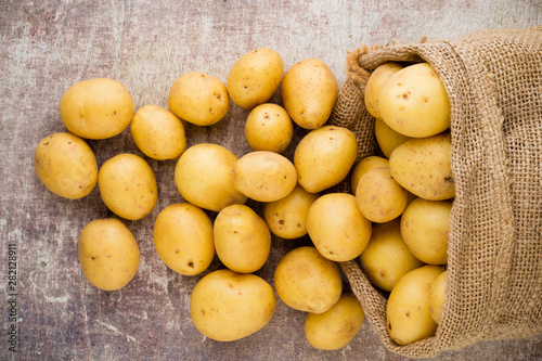 Sack of fresh raw potatoes ...