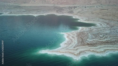 Dead sea coast at sunrise aerial view Drone footage of dead sea shore at sunrise in Israel