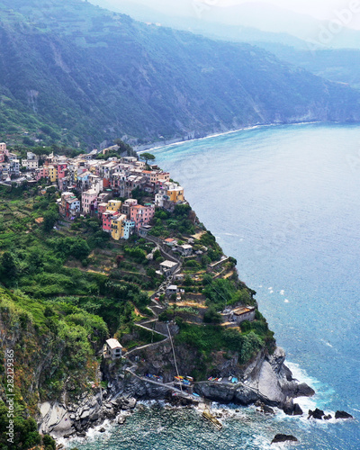 Aerial view of Corniglia village on rocky coast, Cinque Terre, Italy. photo