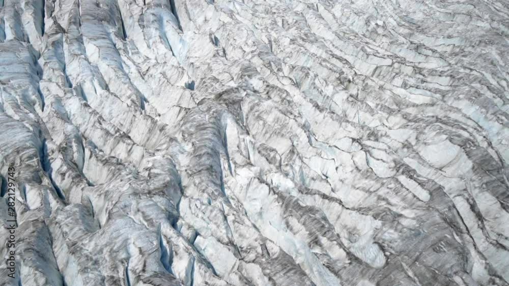 Forward/Pan Up: Textured, Snowy, Gray And White Ground - Mendenhall Glacier, Alaska Forward/Pan Up: Textured, Snowy, Gray And White Ground - Mendenhall Glacier, Alaska