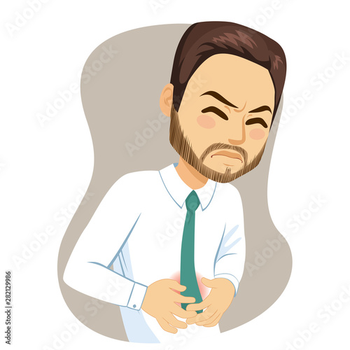 Young adult man with hands on belly suffering strong stomachache pain