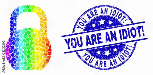 Pixelated spectrum iron pound mosaic icon and You Are an Idiot! watermark. Blue vector rounded scratched seal stamp with You Are an Idiot! message. Vector combination in flat style.