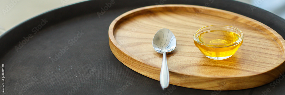 honey, a small portion (a sweet treat in a small portion plate). top view. food background honey, a small portion (a sweet treat in a small portion plate). top view. food background