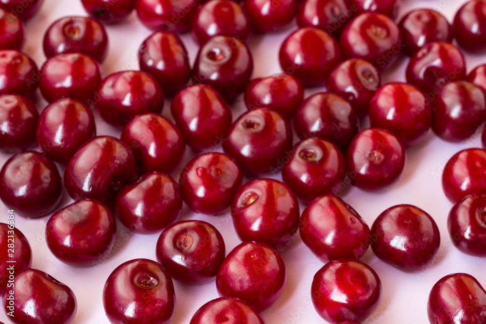 Berries of a cherry close up on a white background Berries of a cherry close up on a white background