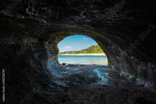Looking Out From A Sea Cave photo