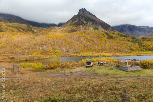 Beautiful autumn landscape in Vachkazhetz volcano, lake and mountains