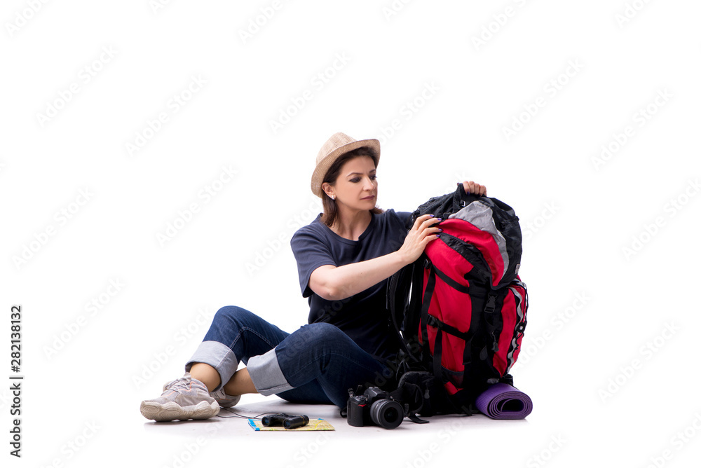 Aged female tourist isolated on white