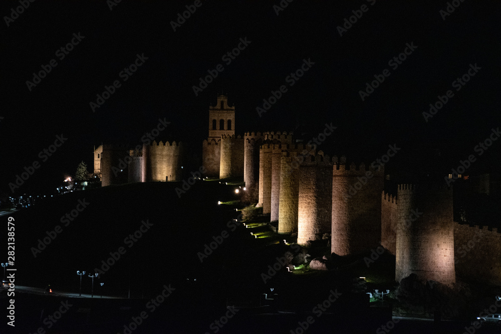 The walls of Avila, Spain taken from the Mirador Ávila at night