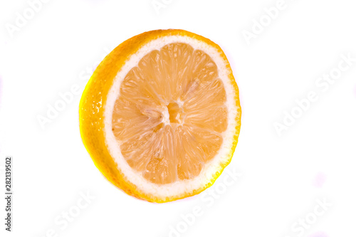 half a lemon on a white background