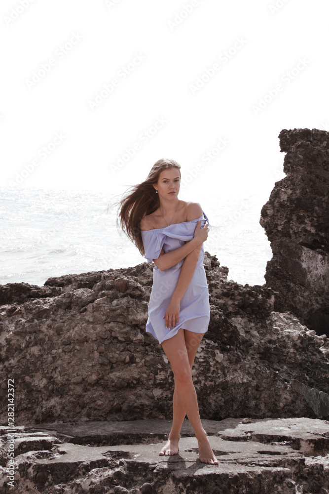 Caucasian young woman on the beach