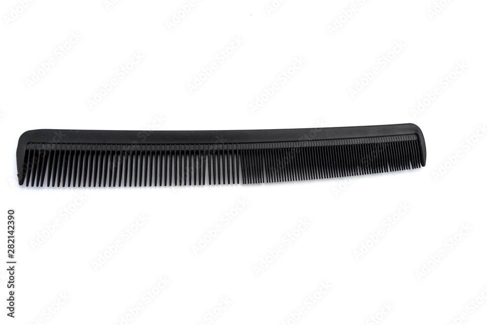 black comb isolated on white background. the concept of beauty black comb isolated on white background. the concept of beauty