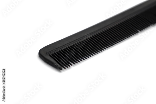 black comb isolated on white background. the concept of beauty